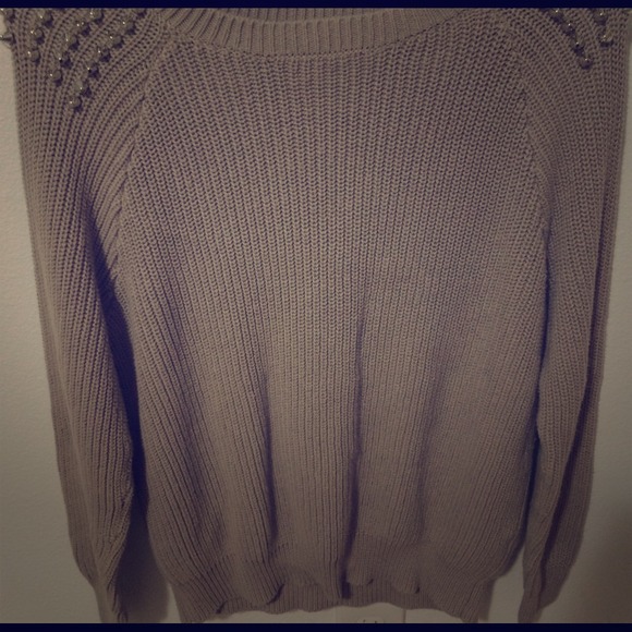 Long brown sweater with studs. 💁