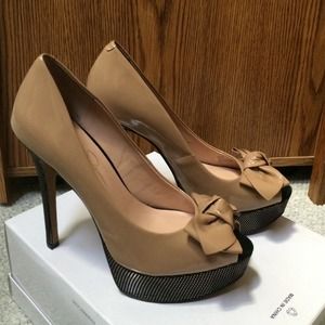 Tan and black bow heels!