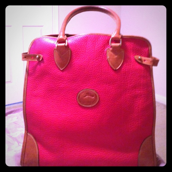 Dooney and bourke red all weather leather bag..