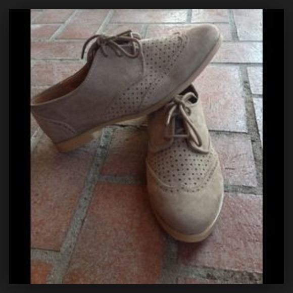 Never worn wing tip shoes