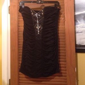 Large black shirt can be worn as a small dress