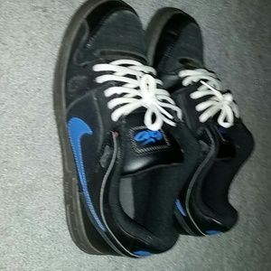 Blue and black nike's