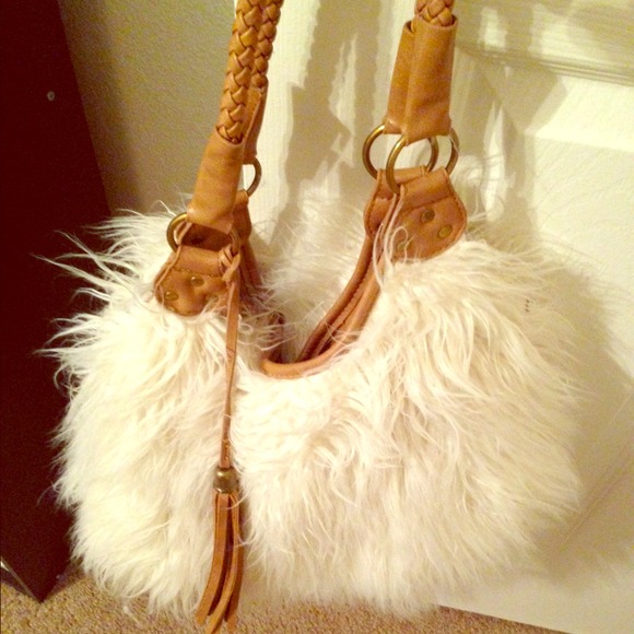 Authentic animal fur and tan leather purse