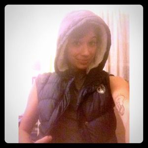 Navy down vest with fake fur lined hood