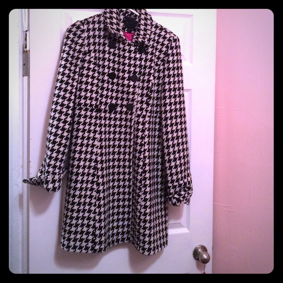 Black-and-white coat with hot pink lining