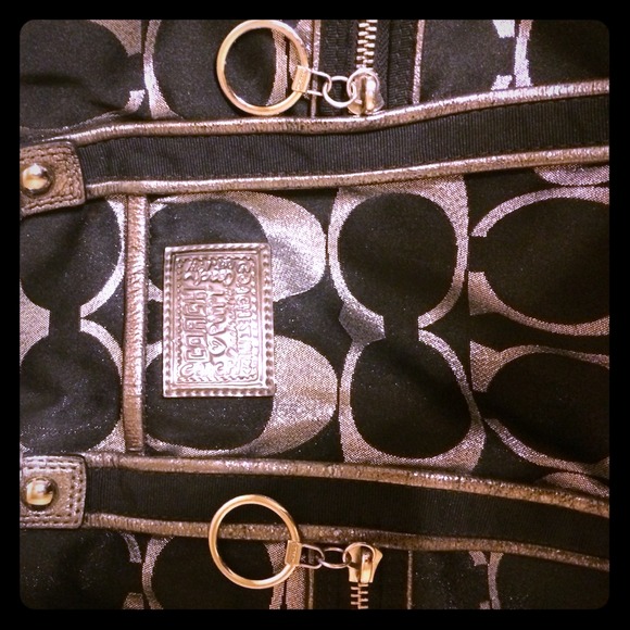 Black and silver coach purse