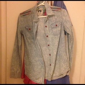 Washed out denim shirt with embellishments