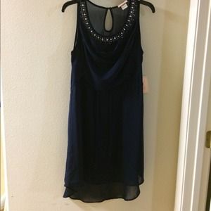 Sleeveless front drape embellished neck dress