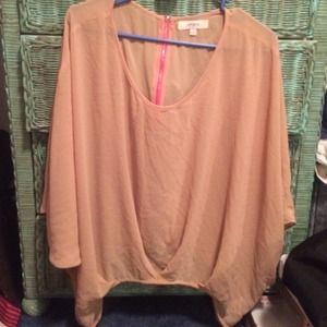 Tan sheer top with hot pink zipper on back