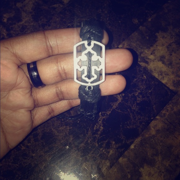 Silver cross bracelet with twine