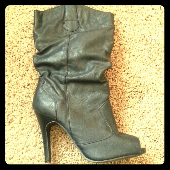 Black Peep toe heeled boots.