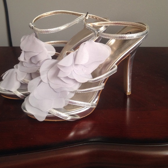 Silver heels, size 8.5 but fit like an 8.