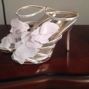 Silver heels, size 8.5 but fit like an 8.