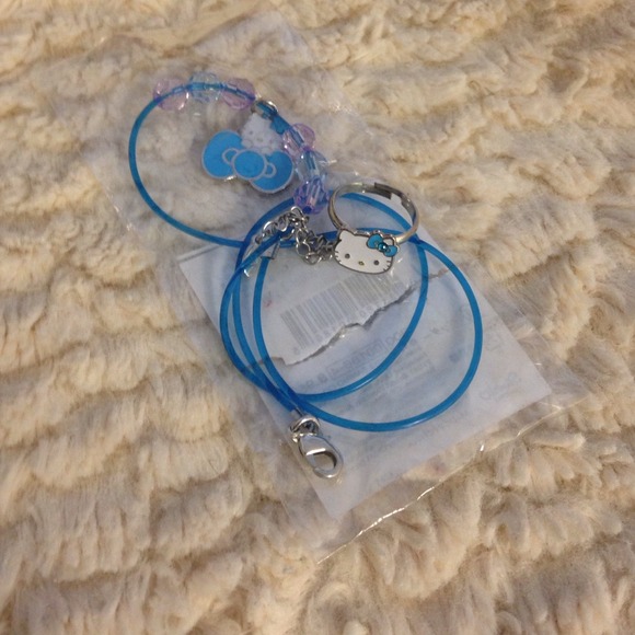 Hello Kitty necklace and ring set.