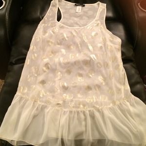 Long loose fit top layer tank. Great with leggings