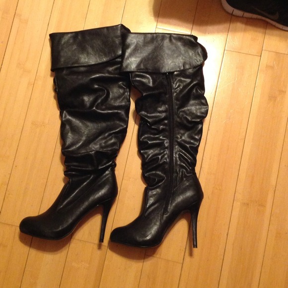 Black High heeled boots Size 8.5