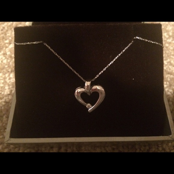 White gold heart necklace.