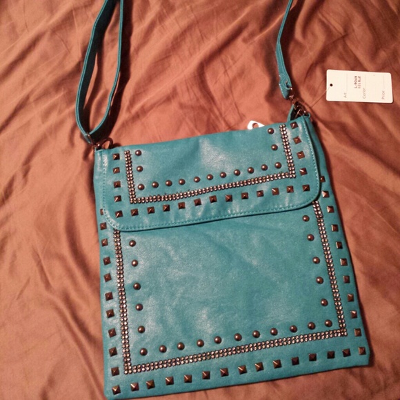 Sold........Cross body blue purse