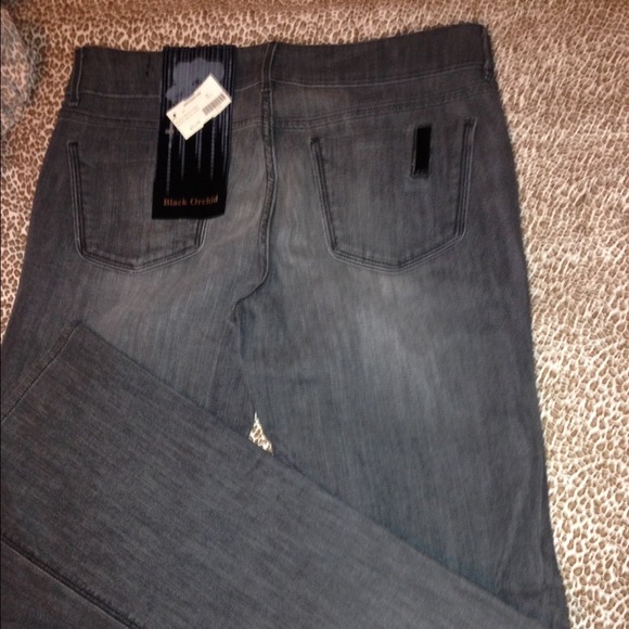 Jeans charcoal color.