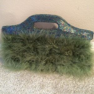 Dark green feather and sequin handbag.