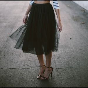 Black, ivory, or gray tulle skirt.