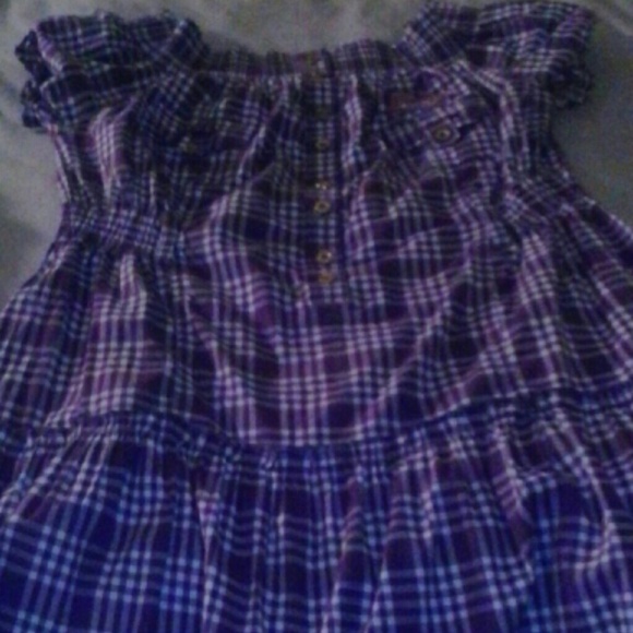 Dress that flairs out at bottom