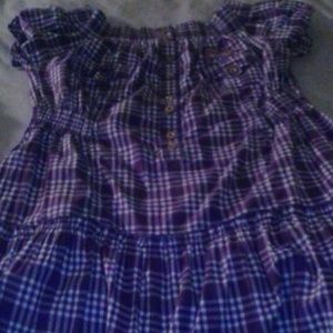 Dress that flairs out at bottom