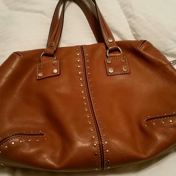 Michael Kors bag in luggage