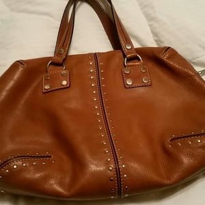 Michael Kors bag in luggage