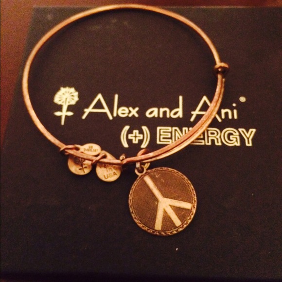 Authentic Alex & Ani gold peace bracelet