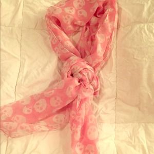 Pink scarf with white skull print