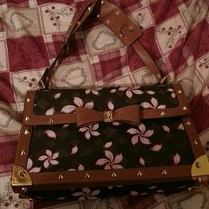 Flower and spike purse