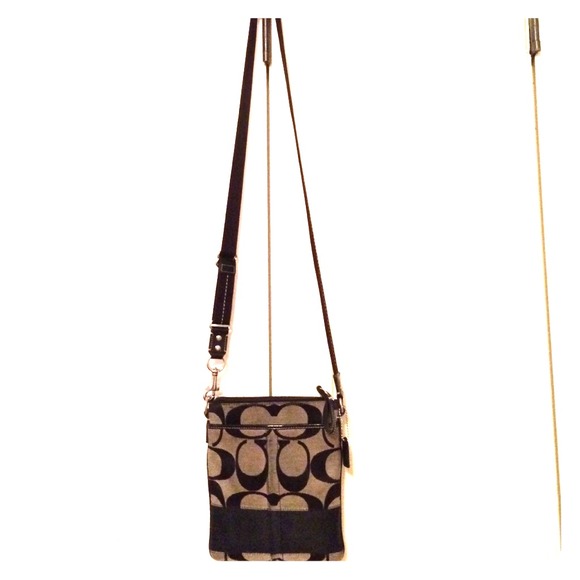 Coach black cross body. Previously loved.