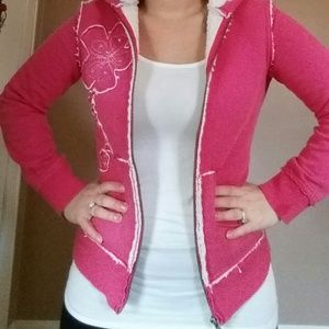 Pink zip-up hoodie sweatshirt with white flowers