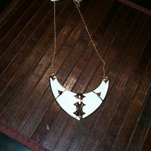 white and gold necklace