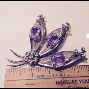 Vintage sterling silver brooch with purple stones
