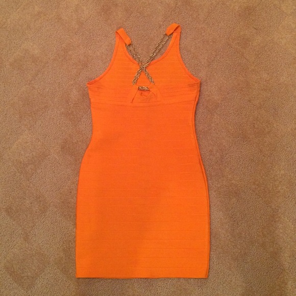 Orange bandage dress gold chain back