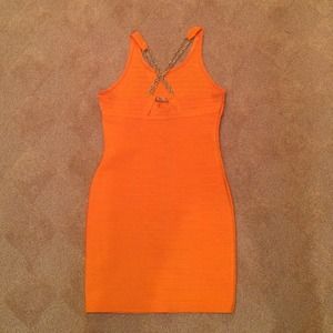 Orange bandage dress gold chain back