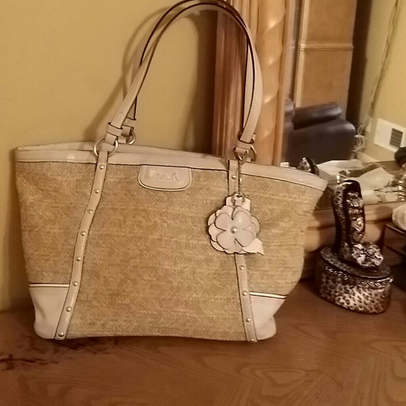 Coach gently used straw with cream leather trim