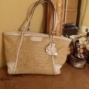Coach gently used straw with cream leather trim