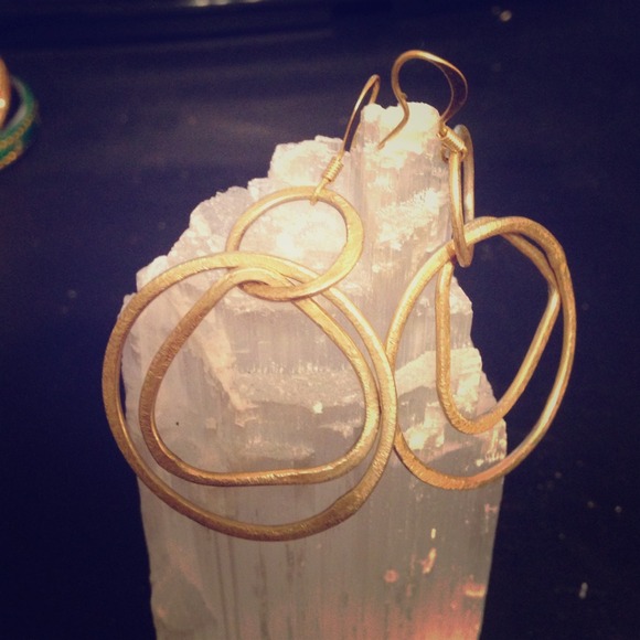Gold circular earrings