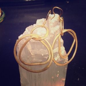 Gold circular earrings