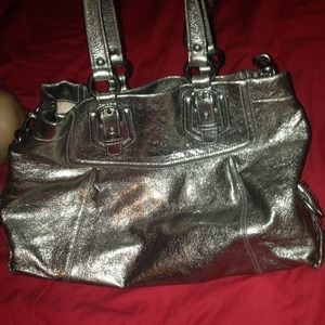 Silver coach purse
