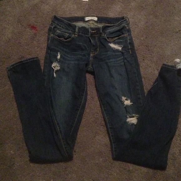 Dark wash bullhead jeans with holes