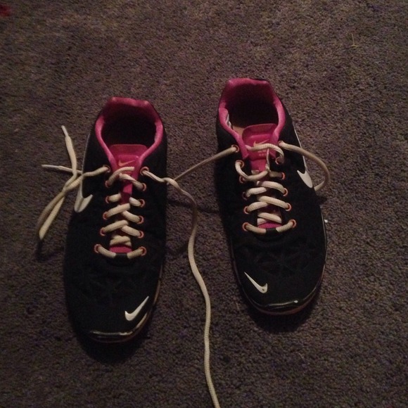 Pink and black nike free tr fit 3 sneakers