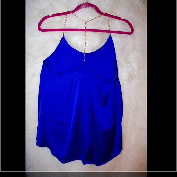 royal blue blouse with gold chain straps