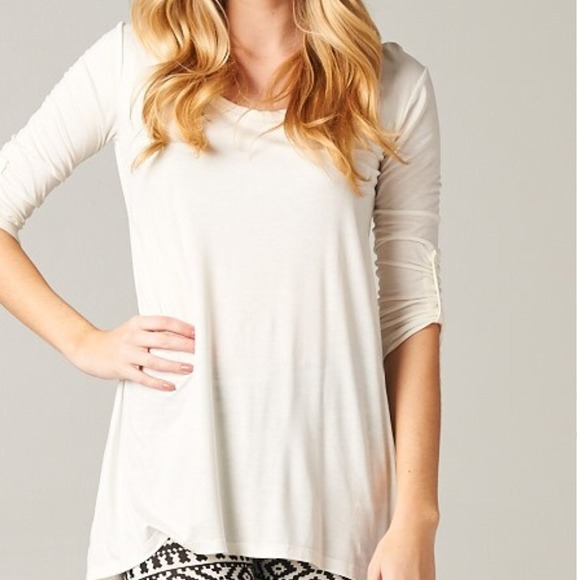 New with tags white tunic with button details