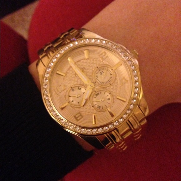 Gold guess watch