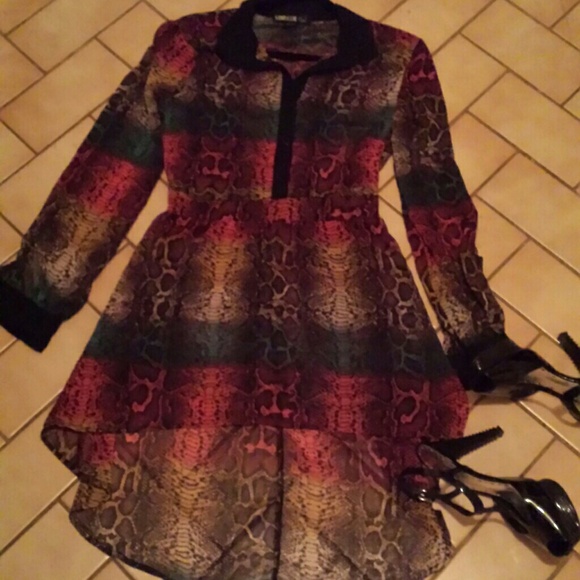 Multi colored reptilian patterned top.