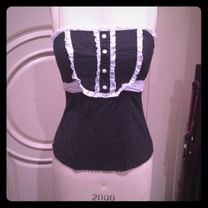 A strapless black and white pin striped top